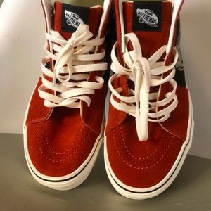 Off the wall we go with this hard to find design High top Vans skate shoes .